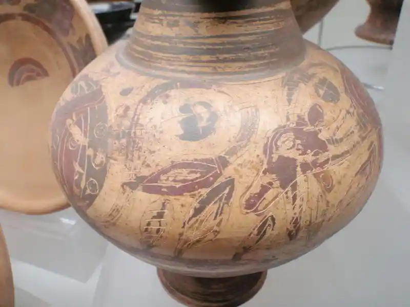 Goat paint with a solar cross on a clay vase, located at the National Etruscan Museum of Villa Giulla, Rome.